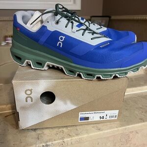 On Running Blue and Green Athletic Shoes Sleek Design